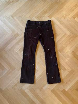 Phipps bootcut cord pants 32 with embroidered stars, bought at VooStore in Berlin.