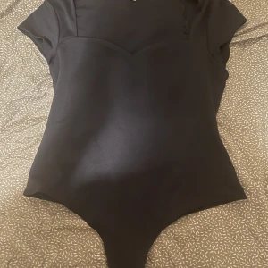 Bodysuit  - Hm bodysuit Aldrig använt Original pris 200