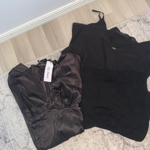 Ett kit med svarta festklänningar  - Säljs endast som kit, ej separat. Har fler individuella bilder på klänningarna i min profil.
