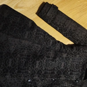 Desuagal strl 38 - Svart desuagal kappa, nyskick 