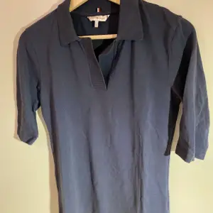 Tommy Hilfiger pique T-shirt with elbow length sleeves. Unworn.