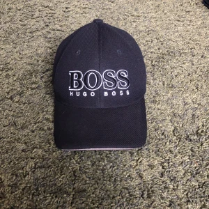 Boss keps - Använd ett fåtal gånger  säljer den för att jag köpt en annan