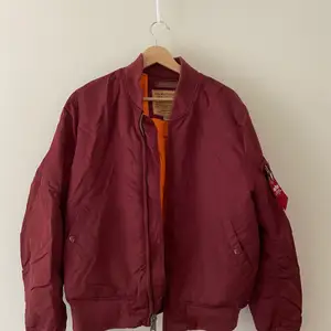 Classic Bomber, burgundy color.