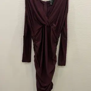 Beautiful colour. Really flattering and perfect for the party season. Worn once only.  Brand: AX Paris 