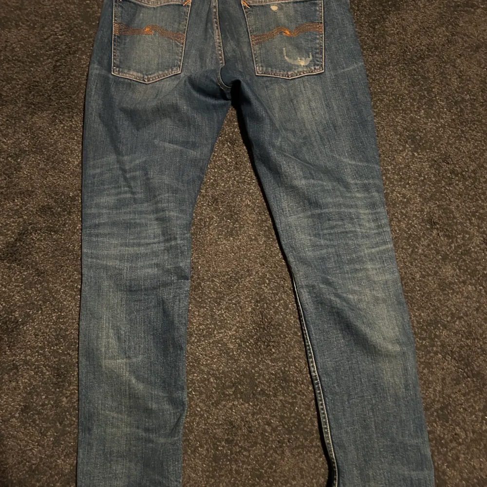 Väldigt snygga nudie jeans i mycket bra skick i strl W32/L30. Jeans & Byxor.