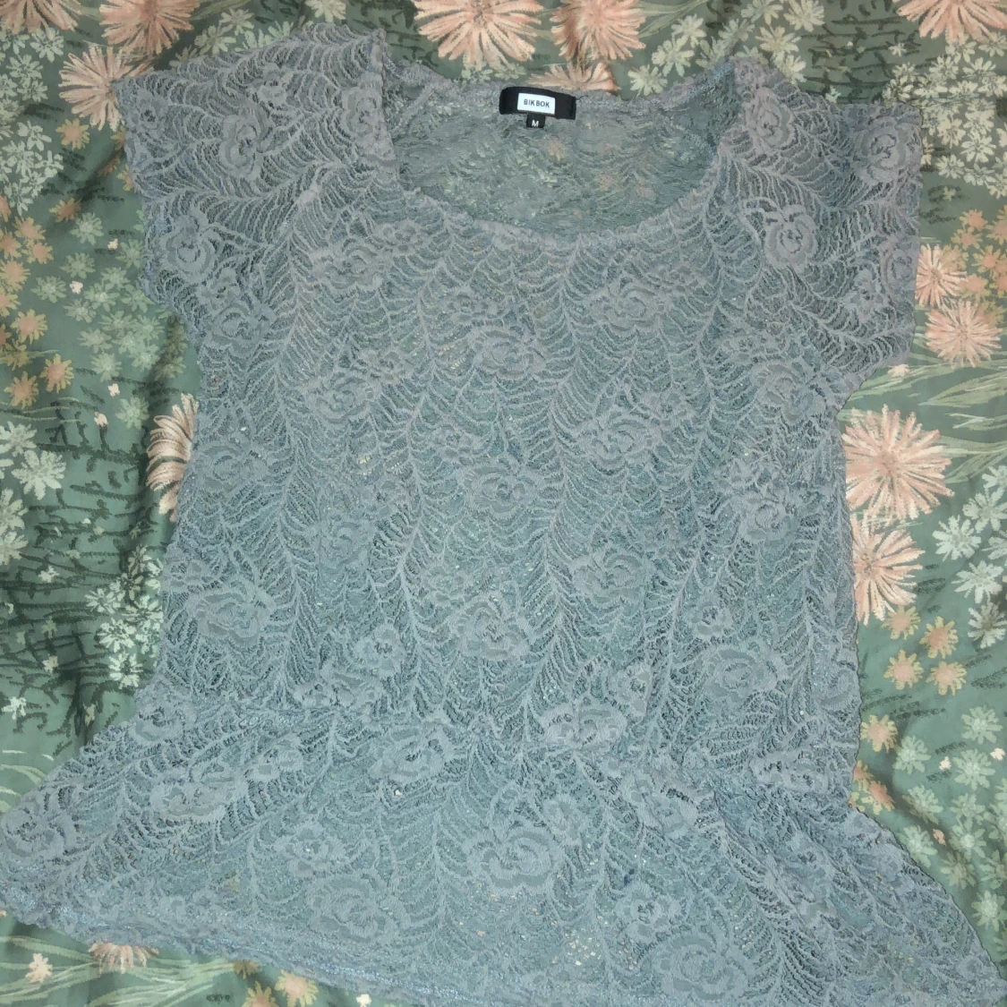 Trendig genomskinlig topp