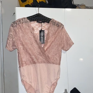 Body med spets  - Aldrig använt helt ny! 