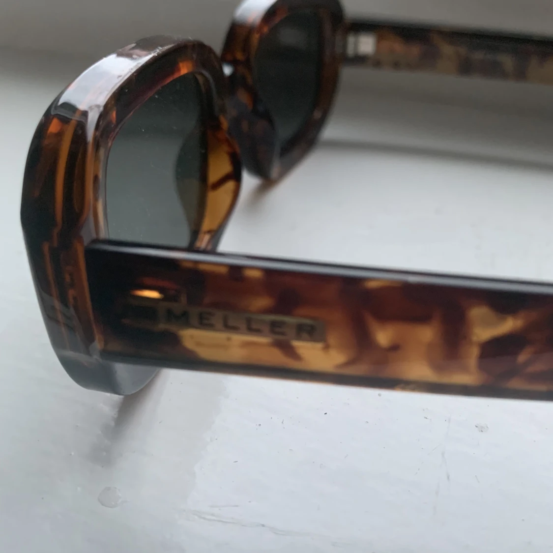 Meller solglasögon - 91