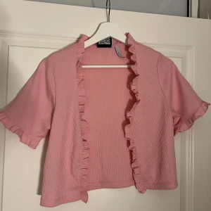 Gullig topp - Rosa gullig topp från ASOS, passade inte på mig tyvärr.  