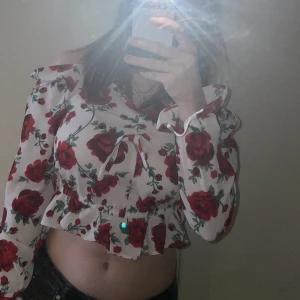 Blommig topp - Använt fåtal gånger