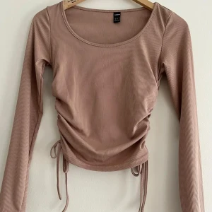 Topp - Använd 1 gång. Bra skick.