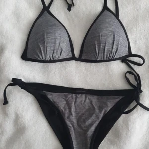 Bikini H&M 36 - Inga tags kvar men aldig använd. Grå och Svart i storlek 36. Köpte för ca 350-400 kr