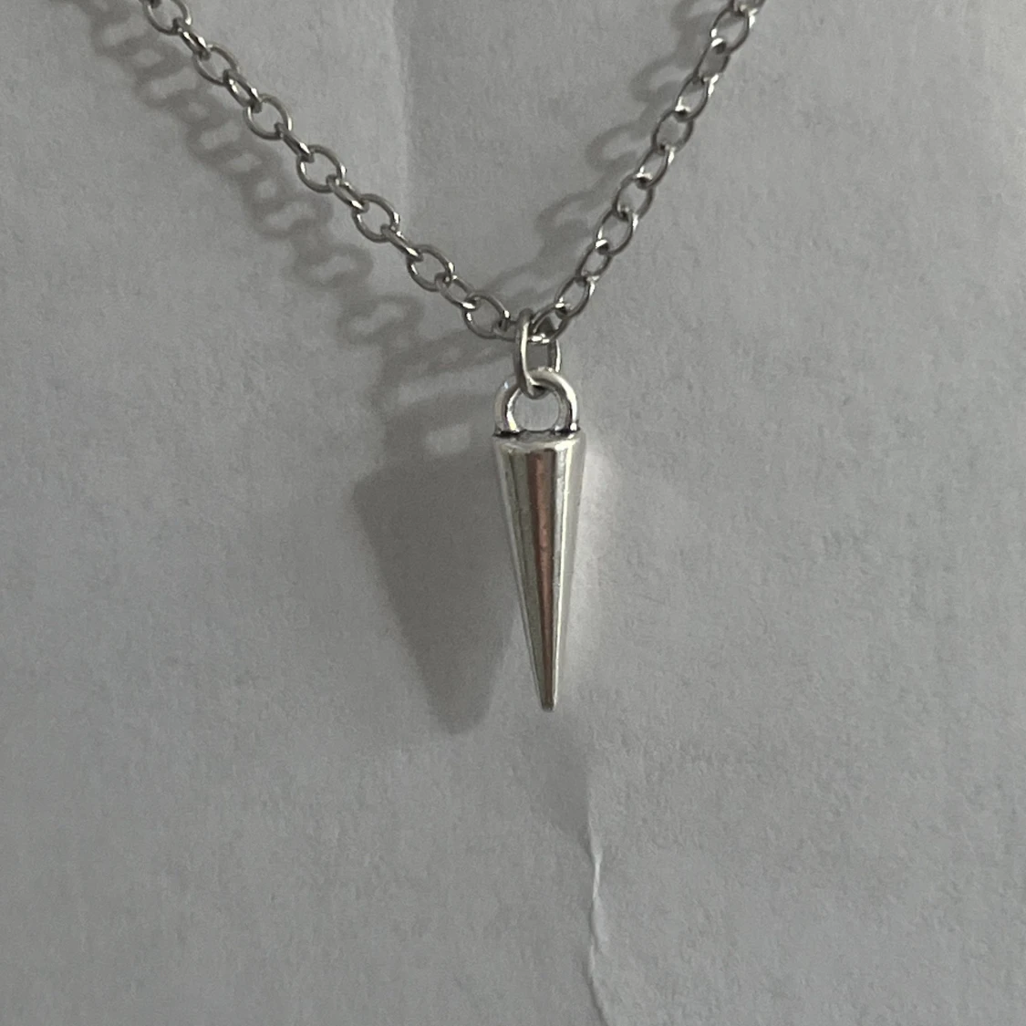 Magiskt nithalsband - 63