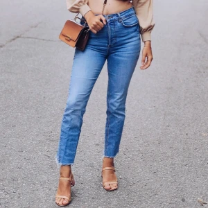 Mid-rise jeans - Mid-rise jeans, ripped bottom. In good shape.