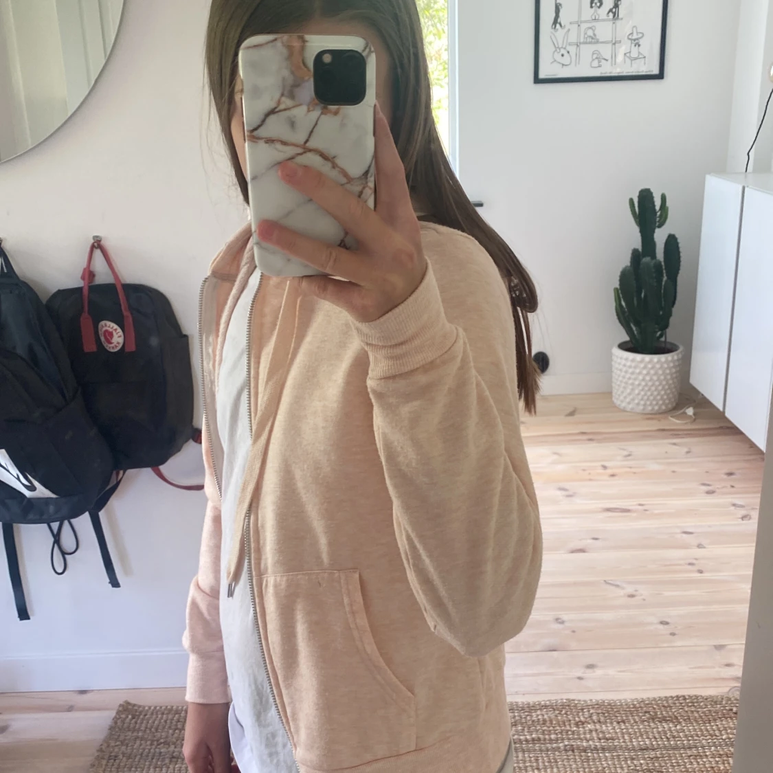 Rosa tröja med dragkedja 