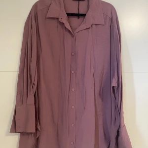Gammelrosa skjorta - Knappt använd skjorna, i bra skick.