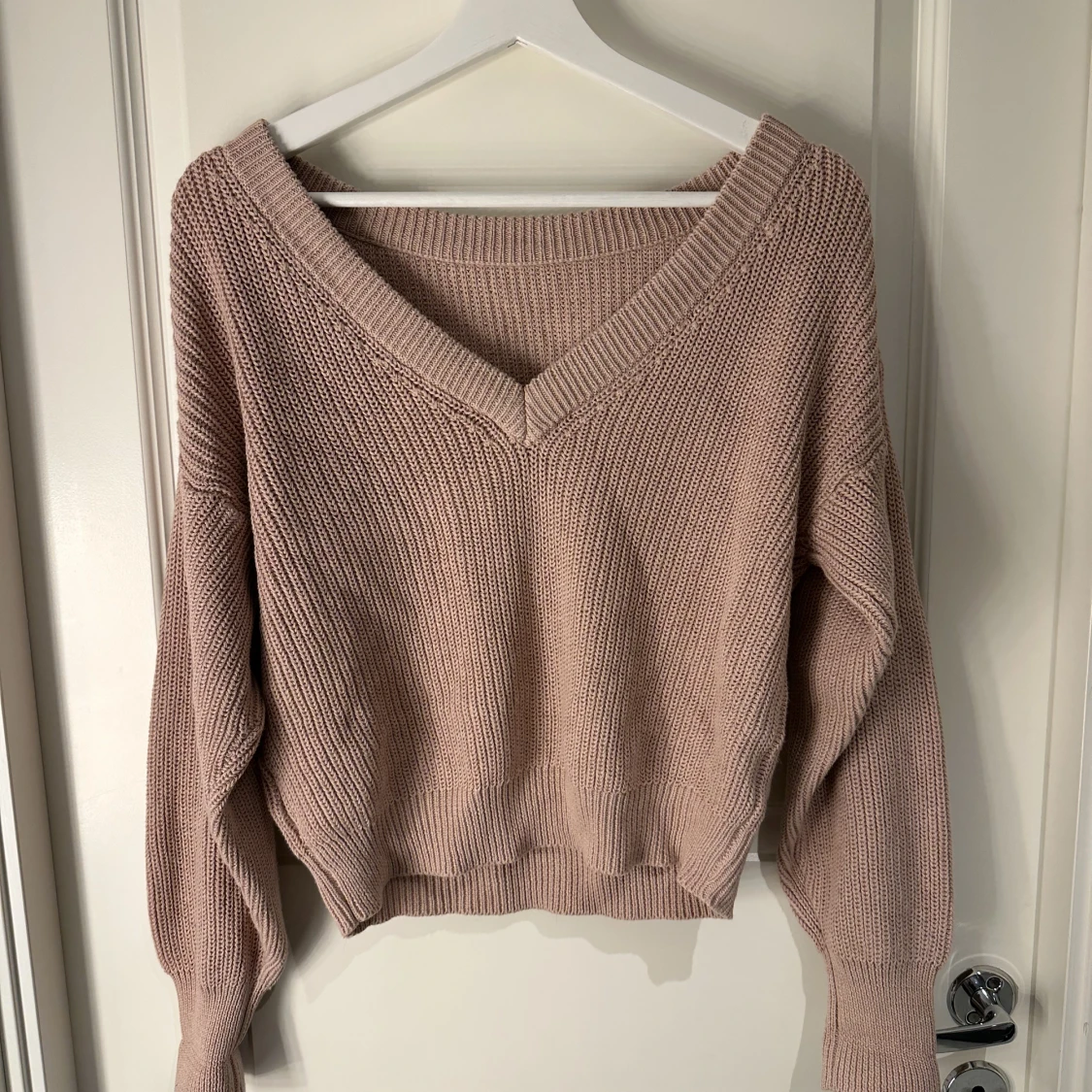 Virkad gammelrosa tröja