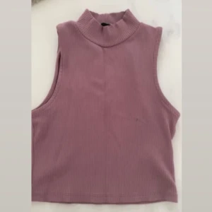 Topp - Rosa topp i storlek M men passar även S