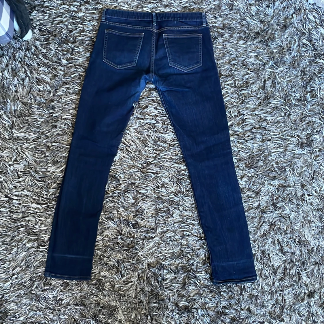 Mörkblåa långmidjade skinny jeans - 90