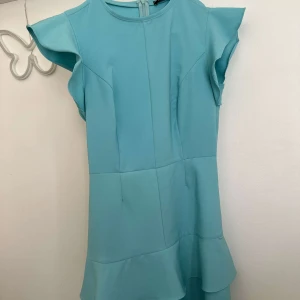 Klänning - Peplum klänning 