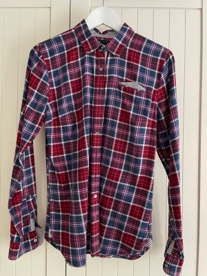 Tommy Hilfiger skjorta - Jättefin TH skjorta, mycket bra skick.