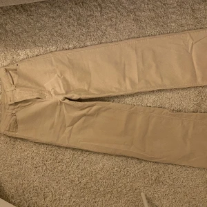 Beige byxa - Använd enstak gång 