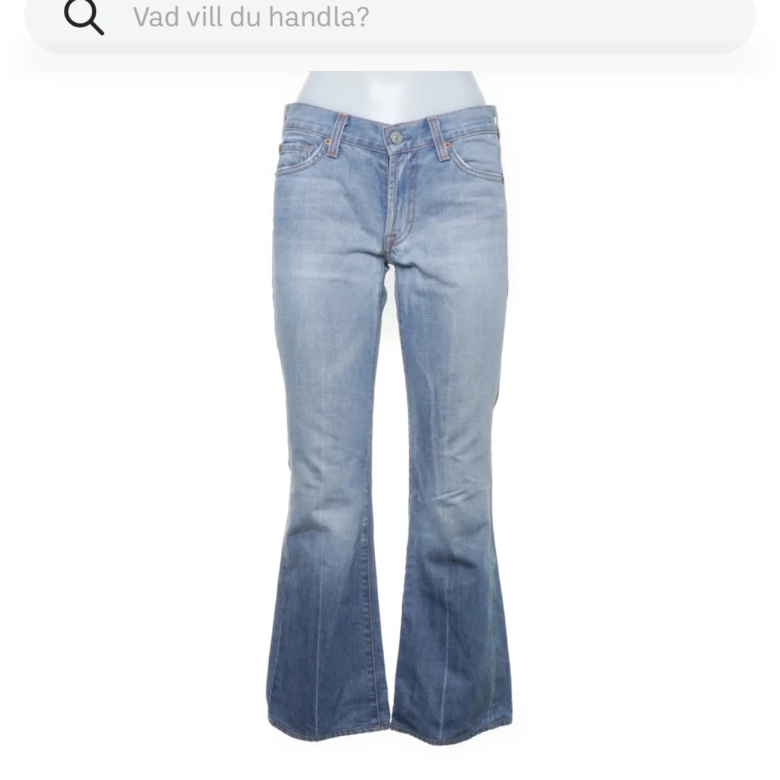Ljusblå lågmidjade jeans