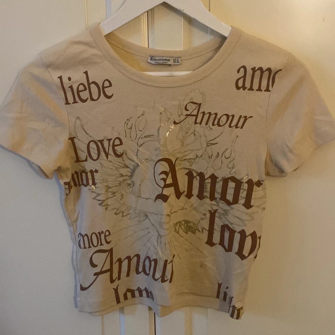 Beige t-shirt med tryck