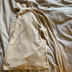 Tröja - Beige ”tröja” med en ärm