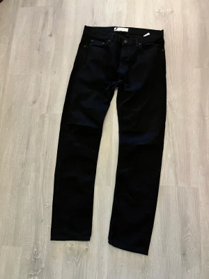 Dressman Jeans - Säljer ett par svarta jeans från dressman.