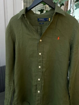 Ralph Lauren Polo militärgrön - jättefin defekter finns på bild nypris 2000 ungefär
