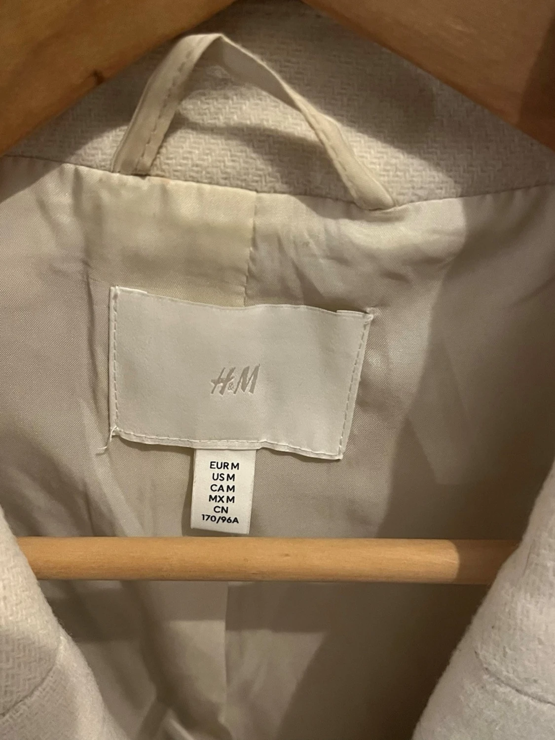 Créme färgad kappa från H&M - 2