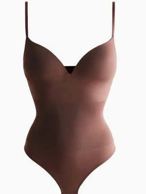 H&M body - Snygg brun shaping body med tunna, justerbara axelband och vadderade kupor💕är verkligen jätte fin men tyvärr för liten för mig, den är endast testad☺️