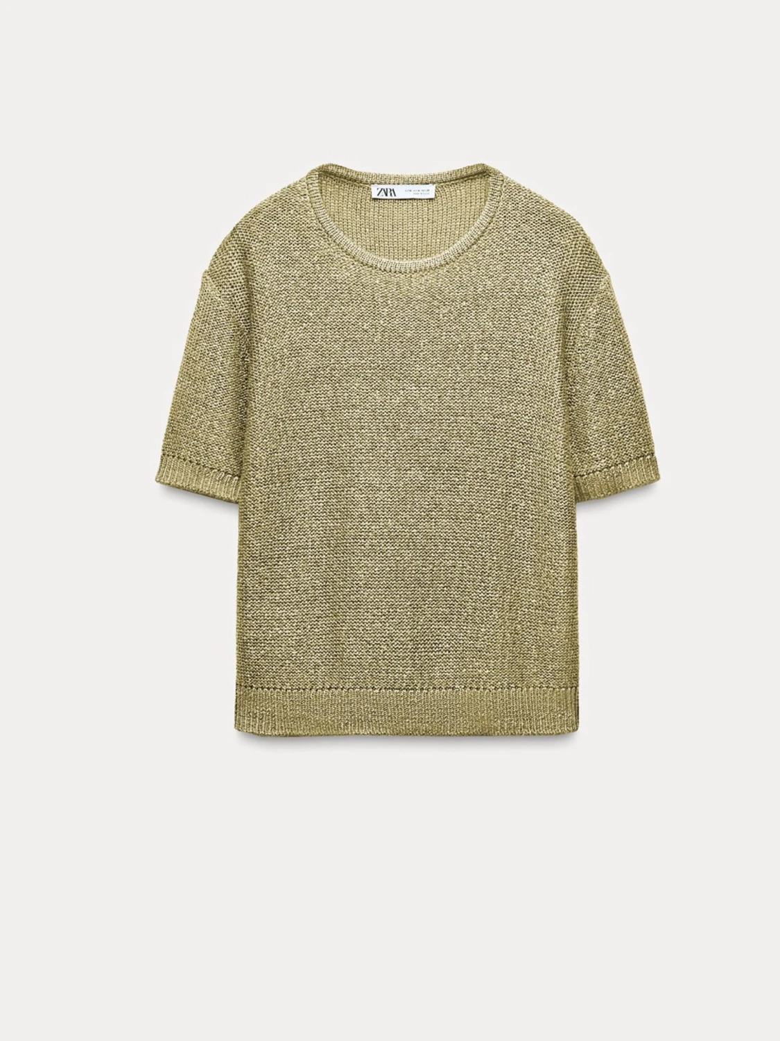 Glittrig guldig topp från Zara