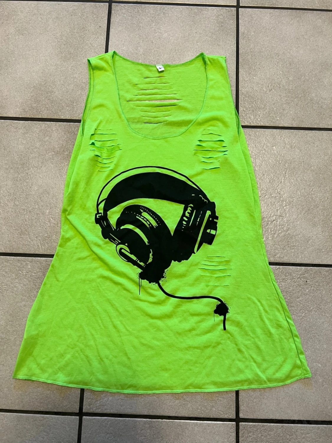 Neongrön linnetopp med hörlursmotiv storlek L