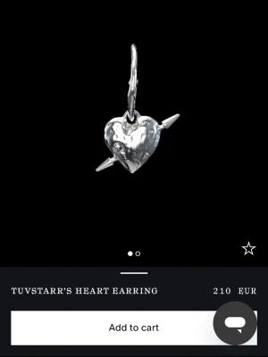 Silverörhänge med hjärta och pil - Så fint örhänge från Maria Nilsdotter. Säljer endast ett