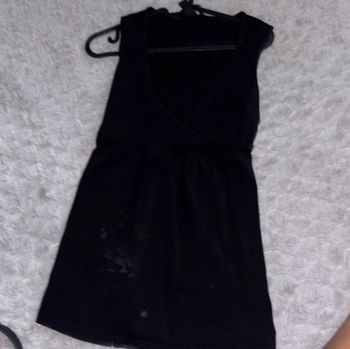 Svart omlott linnetopp - 1