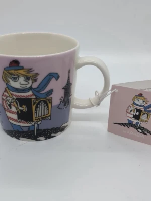 Muminmugg  - Muminmugg med tryck av too-ticki. Helt ny med lapp kvar och inga defekter 😊