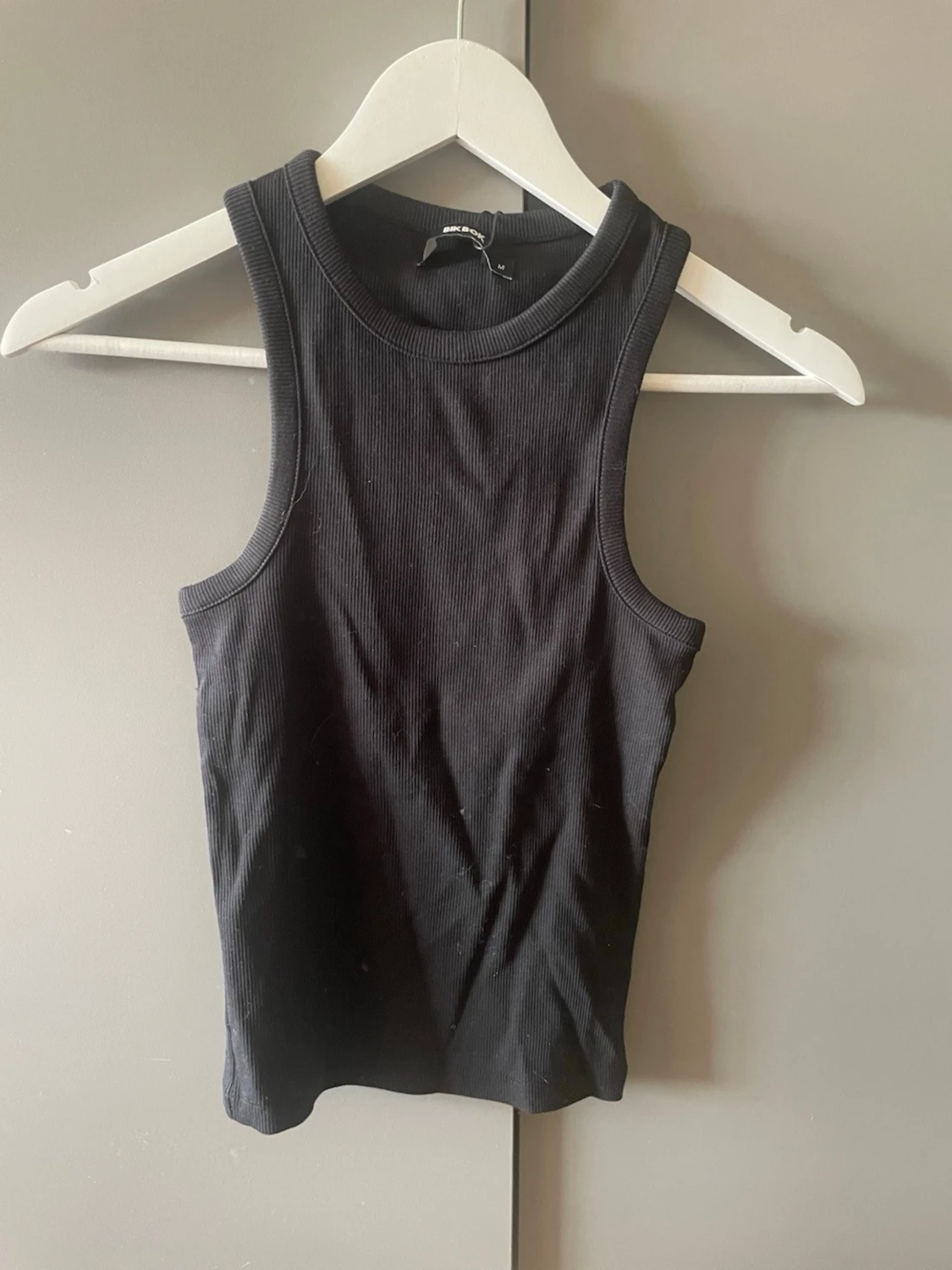 Svart ribbad linnetopp från Bik Bok