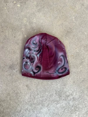 Airbrushed patchwork beanie  - Sewn by us from old fabric scraps and airbrushed by Shamo