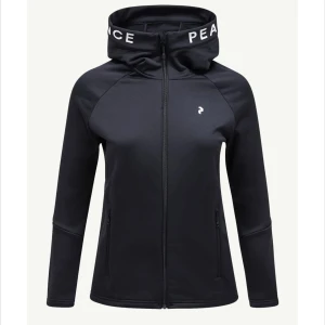 Mörkblå hoddie Peak Performance - Mörkblå hoddie från Peak performance, jättefint skick! Nypris ca 1599💛