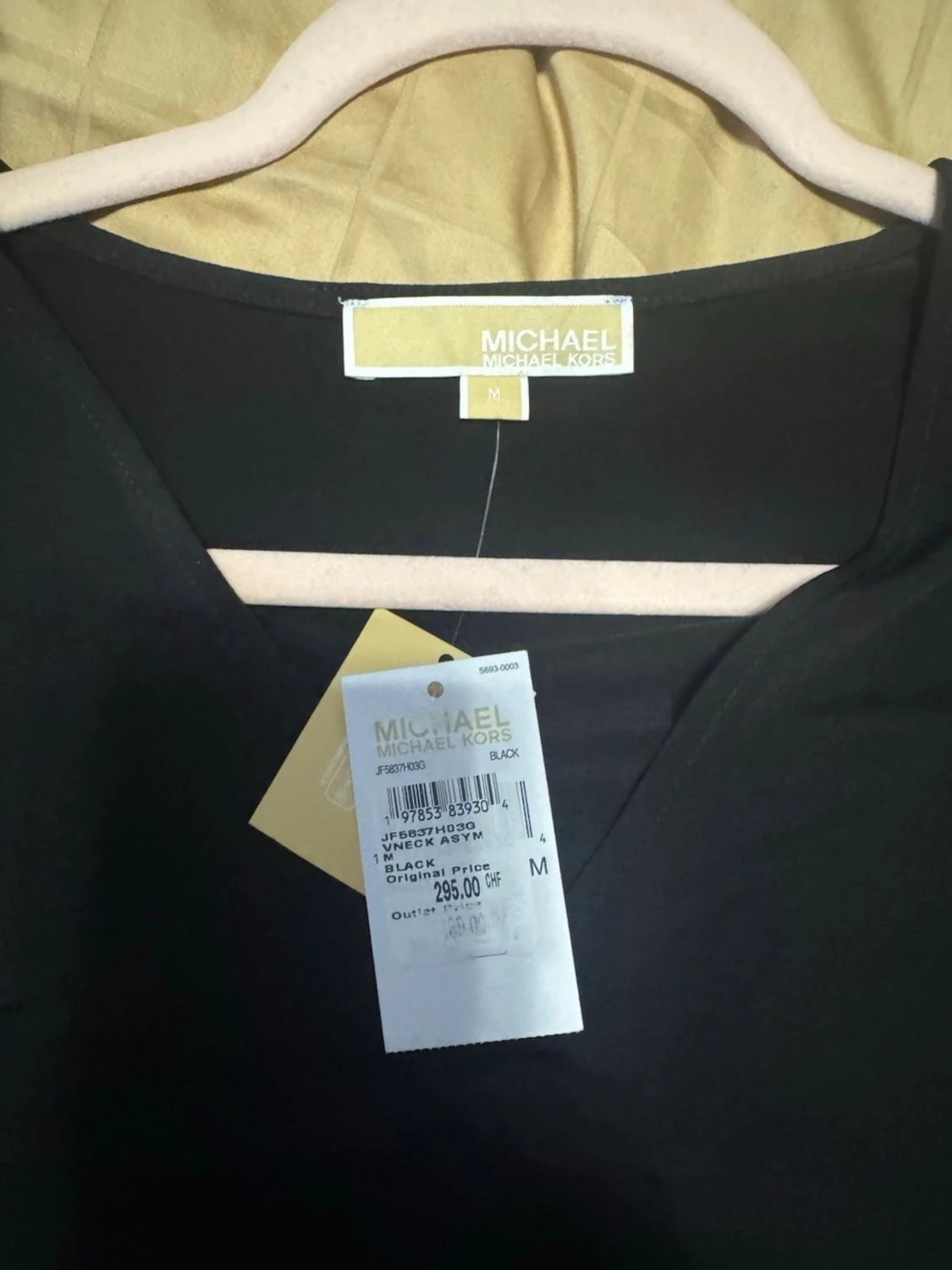 Svart omlottklänning med ringdetalj - 4