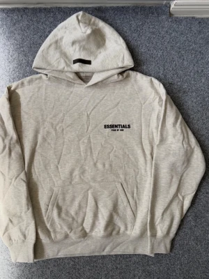 Essentials light oatmeal gray hoodie - Size M, true to size. Just like new. Unused, please feel free to ask questions if needed. Only needs ironing