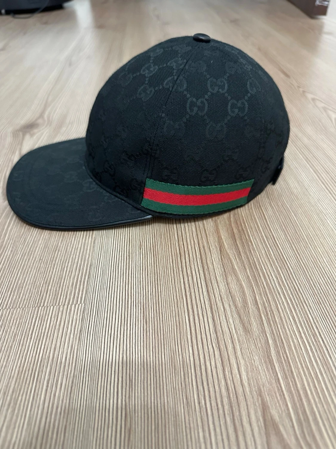 Svart keps med GG-mönster från Gucci - 1