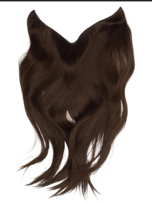 Populära hårbandet från rapunzeln - Längd 45 cm tjockt o fint hår med osynlig snöre och clips de behöver sättas om då de sitter upp o ner färg mörk brun äkta hår 