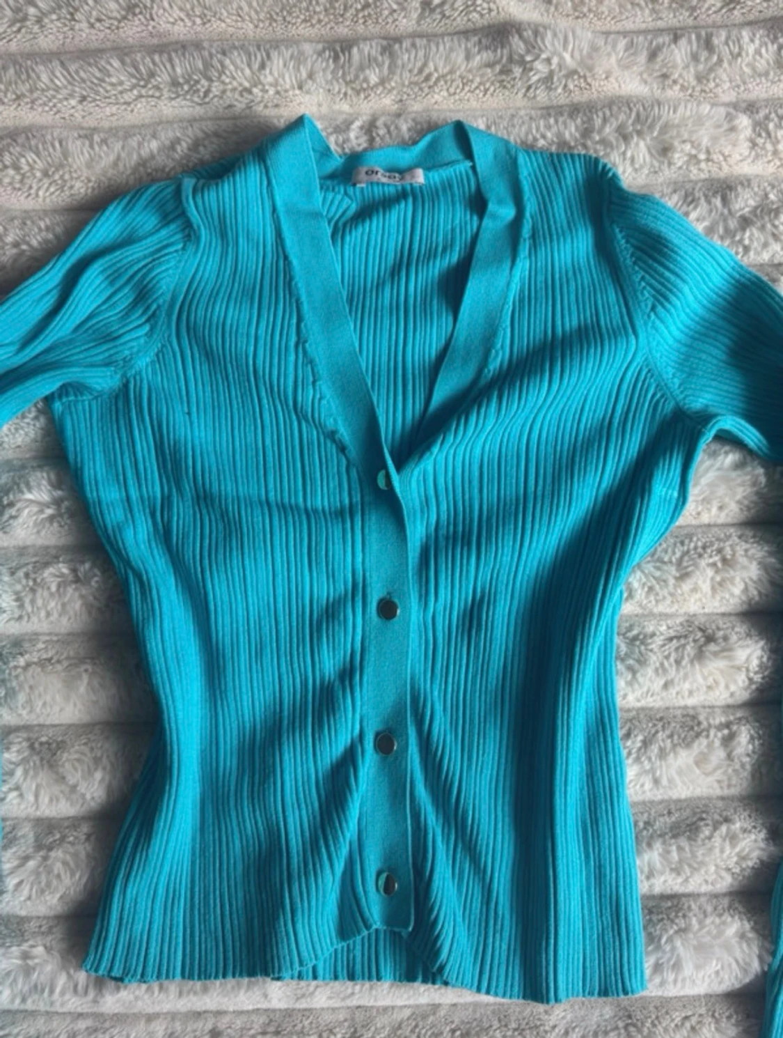 Trendig turkos kofta från Orsay