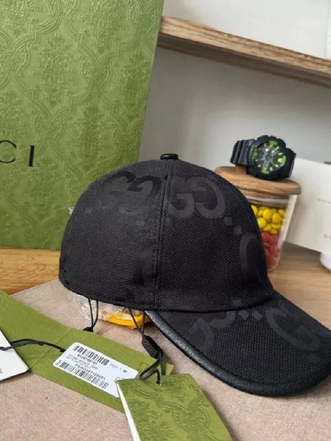 Svart keps från Gucci med GG-mönster - 1