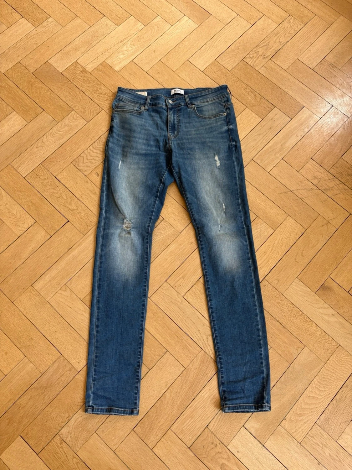 Blå slim fit jeans med slitningar - 1