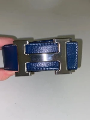 Blå H bälte - Helt nytt
