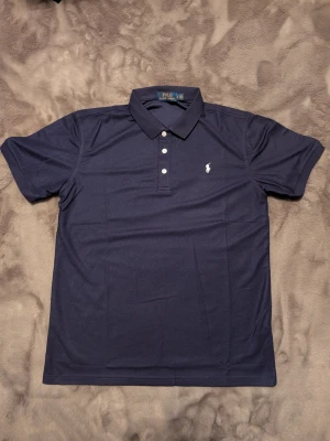 Ralph Lauren pike Mörkblå - Pike i storlek M/L, mycket bra skick öppen för bud.